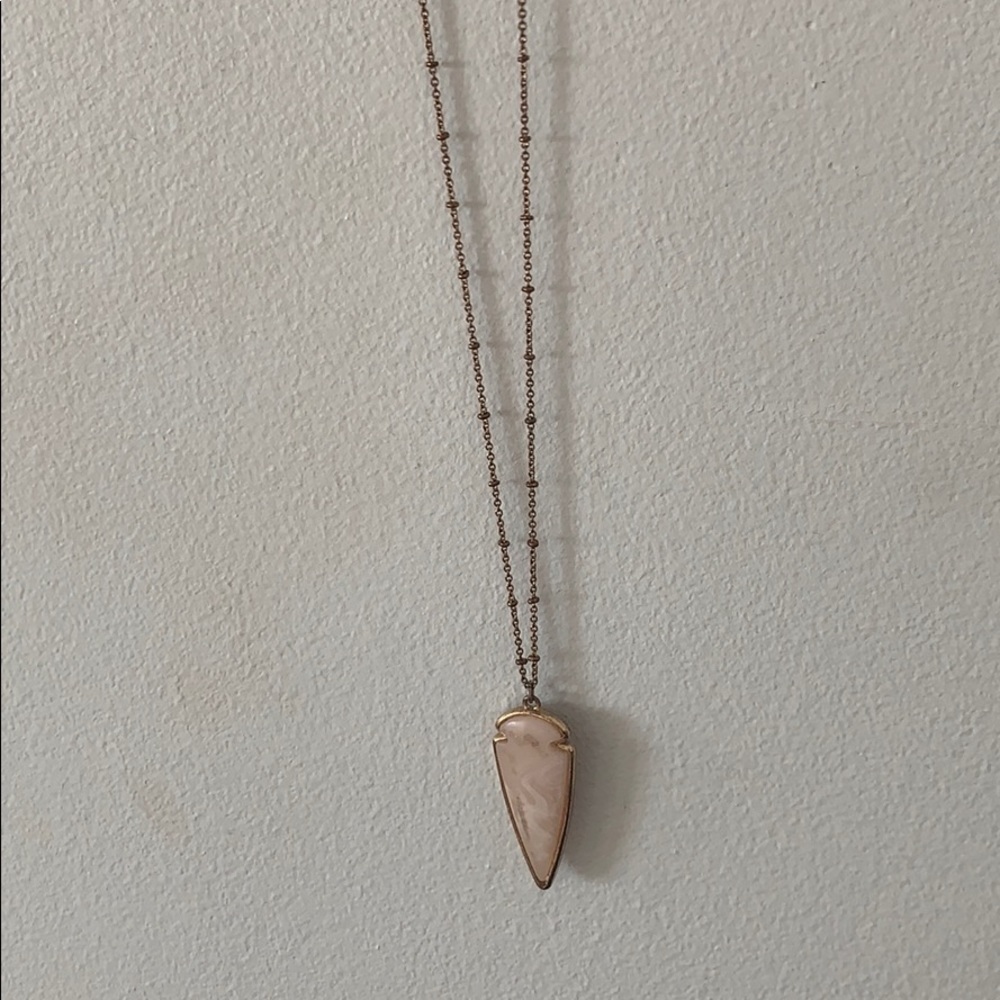 Long pendant necklace with light pink pendant